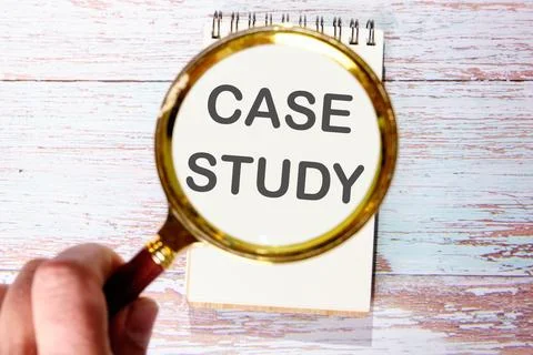 Case study text seen through magnifying glasses on a notepad Stock Photos