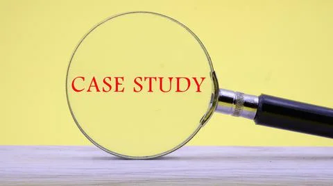 Case study text through a magnifying glass on a yellow background Stock Photos