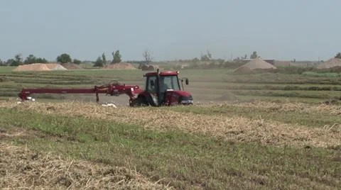 Case Tractor Raking Pan Right Stock Footage 40462656