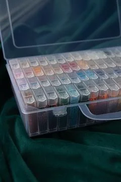 Case with transparent boxes for beads Stock Photos