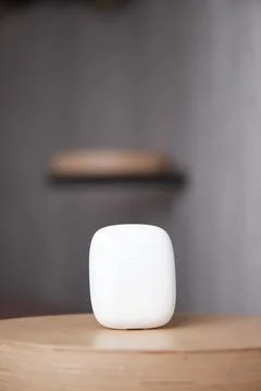 The case for wireless headphones is on the table the closed cover of the Stock Photos