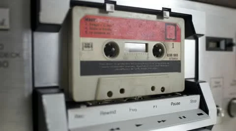 Casette sequence on a retro player Stock Footage 21928407