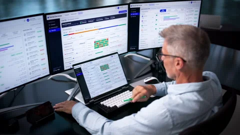 Caseworker Using Laptop To Manage Client Benefits Stock Footage 344711108