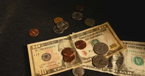 Cash &amp; coins fall - 4K Stock Footage 83798803