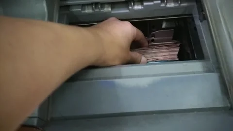 Cash deposit activity to automatic teller machine 動画素材 201172256