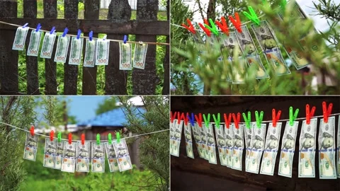 Cash laundry concept. Split screen. Paper hundred dollar bills on a rope. One Video stock 202237411