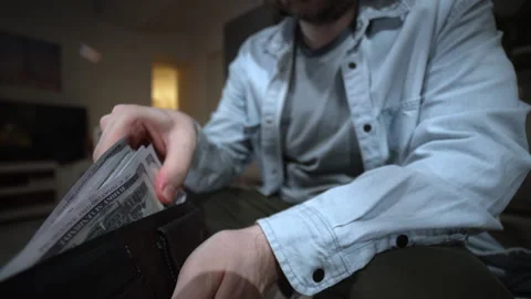 Cash Overflow Problem With Money Stack. Thick Cash Stack Too Big for Wallet Video stock 324516647