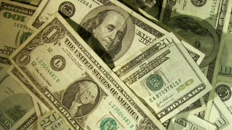 Cash Pile - Spin to a Stop Stock Footage