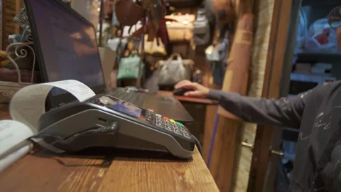Cash Register and Payment Processing Systems used in Retail Store Operations and Stock Footage 315339870