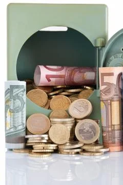Cash on safe Stock Photos