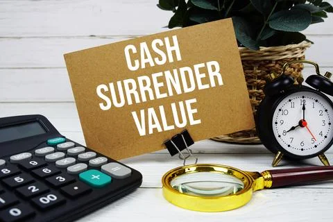 Cash Surrender Value text on paper card with alarm clock, calculator and ma.. Stock Photos