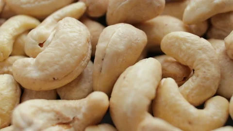 Cashew closeup. Rotating nuts background Stock Footage 106379986