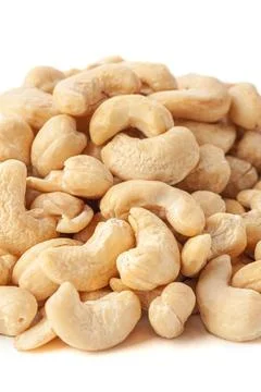 Cashew group. Close-up. White background . Isolated. Stock Photos