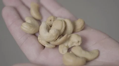 Cashew in human hands Video stock 79020487