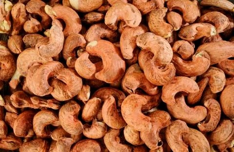 Cashew nuts burned background Stock Photos
