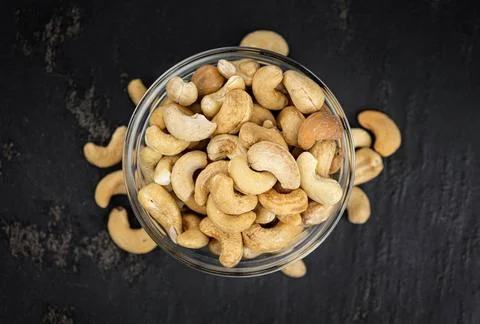  Cashew Nuts (close up shot; selective focus) Portion of Cashew Nuts (clos... Foto stock