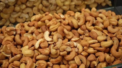 Cashew nuts close-up on the store counter Stock Footage 232335889