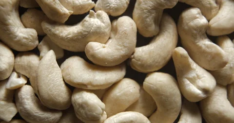 Cashew nuts close up studio shot over rotating Stock Footage 324838342