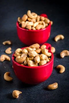 Cashew nuts in the cups Stock Photos
