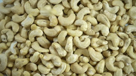 Cashew nuts fall in slow motion Video stock 134595164