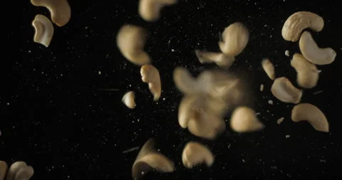 Cashew nuts falling from below, slowmotion low angle 4K pro res Stock Footage 275897622