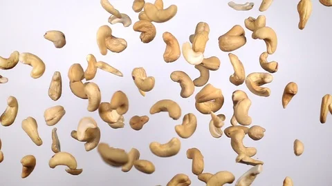 Cashew nuts flying in slow motion Stock Footage 117354532