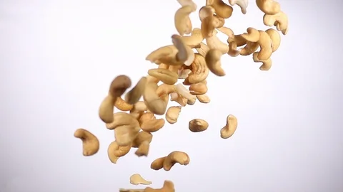 Cashew nuts flying in slow motion Stock Footage 117354562
