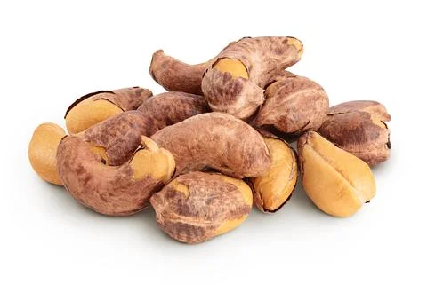 Cashew nuts heap with shell isolated on white background Stock Photos