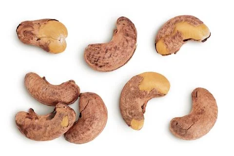 Cashew nuts heap with shell isolated on white background. Top view. Flat lay Foto stock