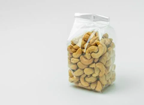 Cashew nuts in plastic packaging 스톡 사진