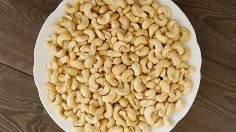 Cashew nuts on a plate. 스톡 동영상 297185032