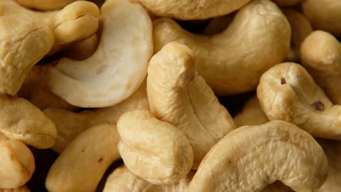 Cashew nuts rotating, macro shot. Top view Stock Footage 125292032