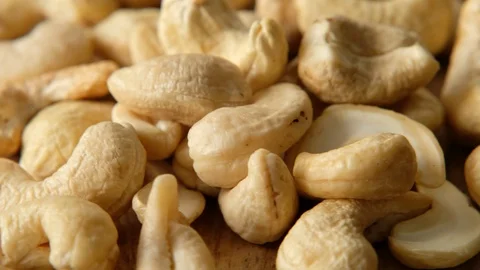 Cashew nuts rotating, macro shot. Top view Vídeos de archivo 125603170