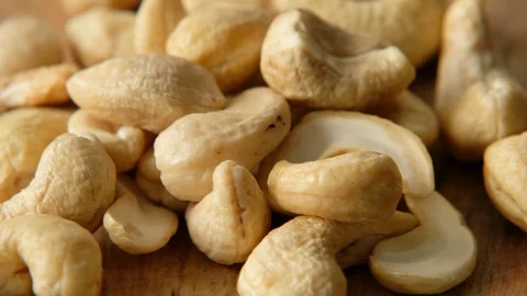 Cashew nuts rotating, macro shot. Top view Stock Footage 128309282