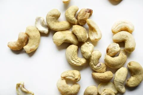 Cashew nuts on a white background close-up. Stock Photos