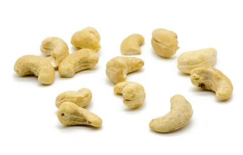 Cashew nuts on white background Stock Photos