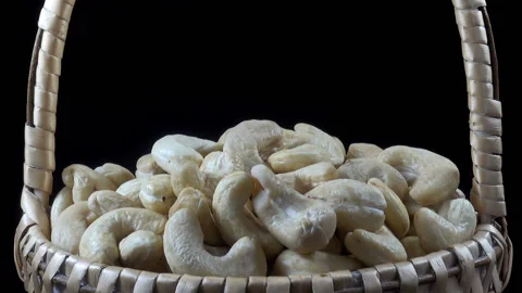 Cashew nuts in a wicker basket Stock Footage 154857602