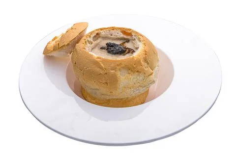 Cashew Truffle Mushroom Soup served in Bread Bowl isolated on white backgroun Stock Photos