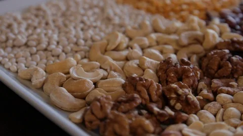 Cashew, walnut, peanuts.close-up.the camera moves around this to the left. Stock Footage 114739832
