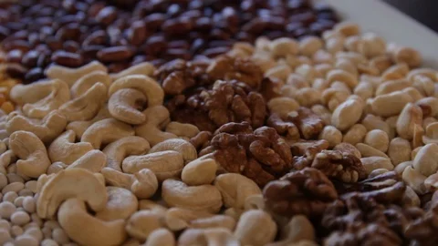 Cashew, walnut, peanuts.close-up.the camera moves around this to the right. Stock Footage 114739889