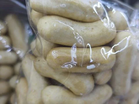 Cashews in clear plastic packaging. 库存照片
