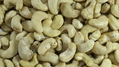 Cashews fall on rotating nuts Vídeo Stock 152465086