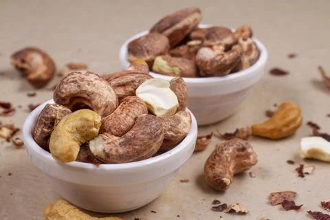 Cashews isolated on light background. Flat lay Stock Photos