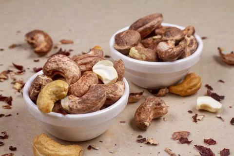 Cashews isolated on light background. Flat lay Stock Photos