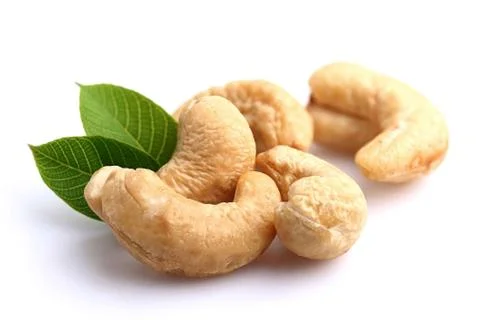 Cashews on a white isolated background Stock Photos