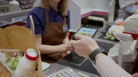 Cashier Scanning Discount Code in App Stock Footage 304036518