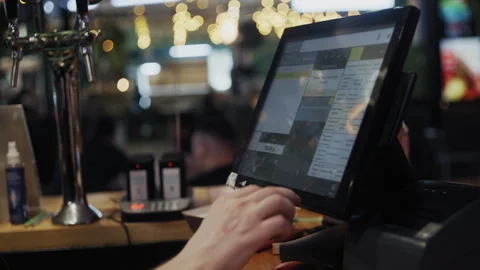 Cashier Using Touch Screen Register Stockbeeldmateriaal 307087826