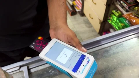 Cashless payment process with touchscreen pos machine in modern retail store Stock Footage 335315095