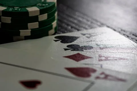 Casino chips and cards on the table. Poker gambling concept Photos