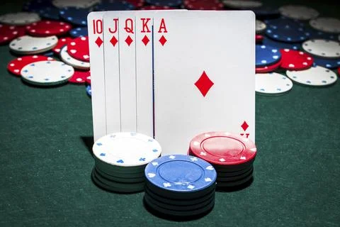 Casino chips stack front royal flush playing card 스톡 사진